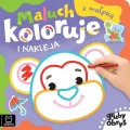Maluch kolorujei nakleja z małpką. Gruby obrys