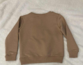 BLUZA CHŁOPIĘCA ZE ŚWIĘCĄCĄ APLIKACJĄ BEŻ