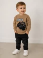 BLUZA CHŁOPIĘCA ZE ŚWIĘCĄCĄ APLIKACJĄ BEŻOWA